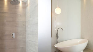 Residential bathroom tiled with Mosa textured planks